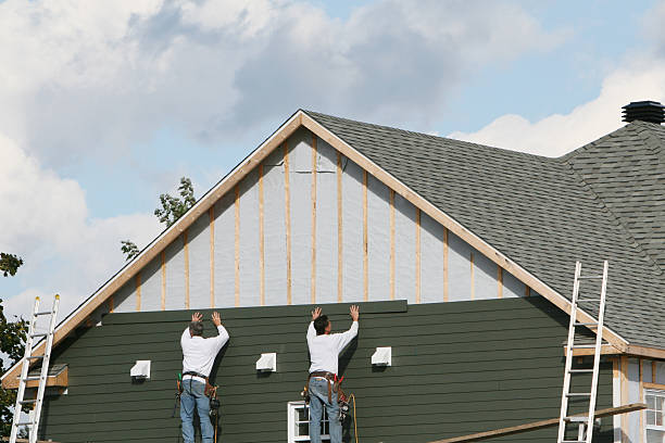 Professional Siding Replacement technician working in Rougemont, NC